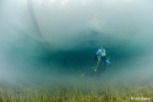 Mystic atmosphere (diving after a flood) by Raoul Caprez 